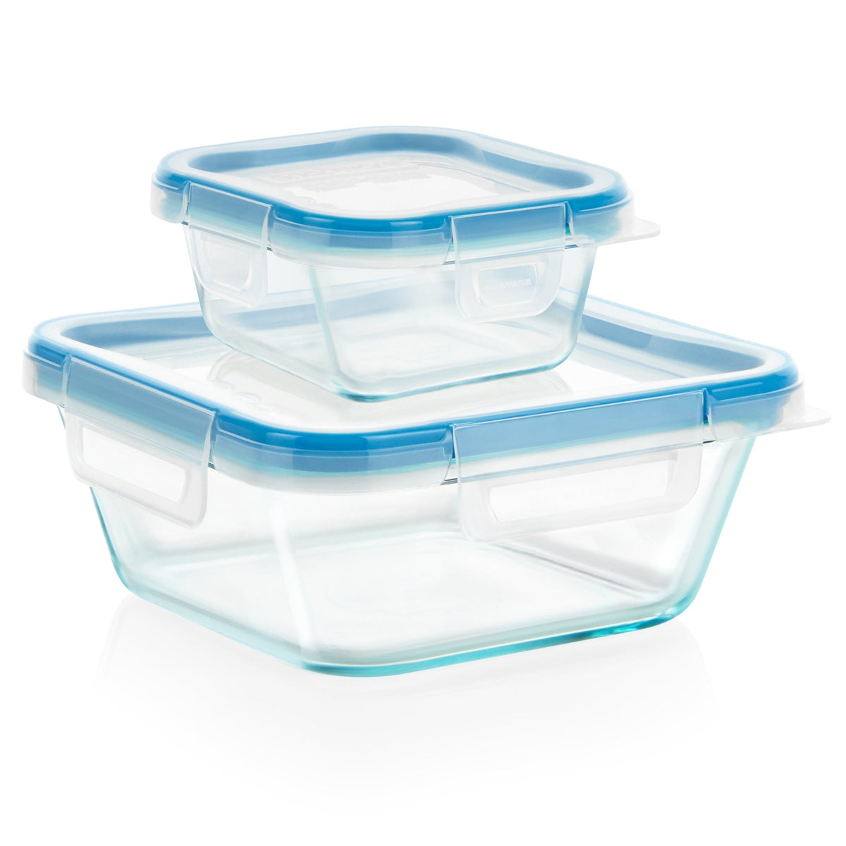 Set of glass food storage containers with blue lids on a white background