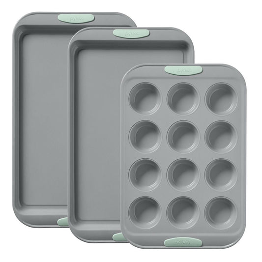 Set of three gray baking trays with green silicone grips on a white background