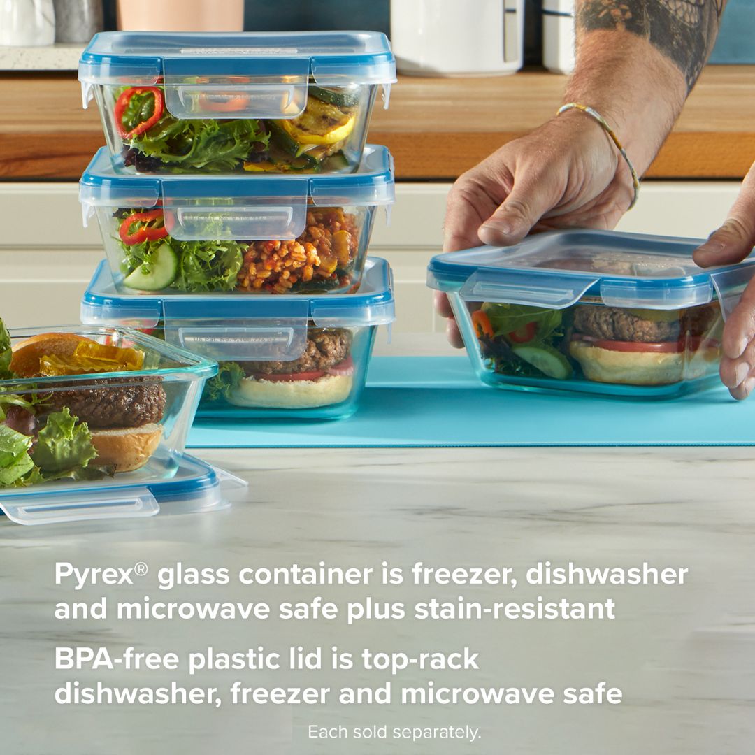 Pyrex glass containers with lids on a kitchen counter, with text about their safety features.